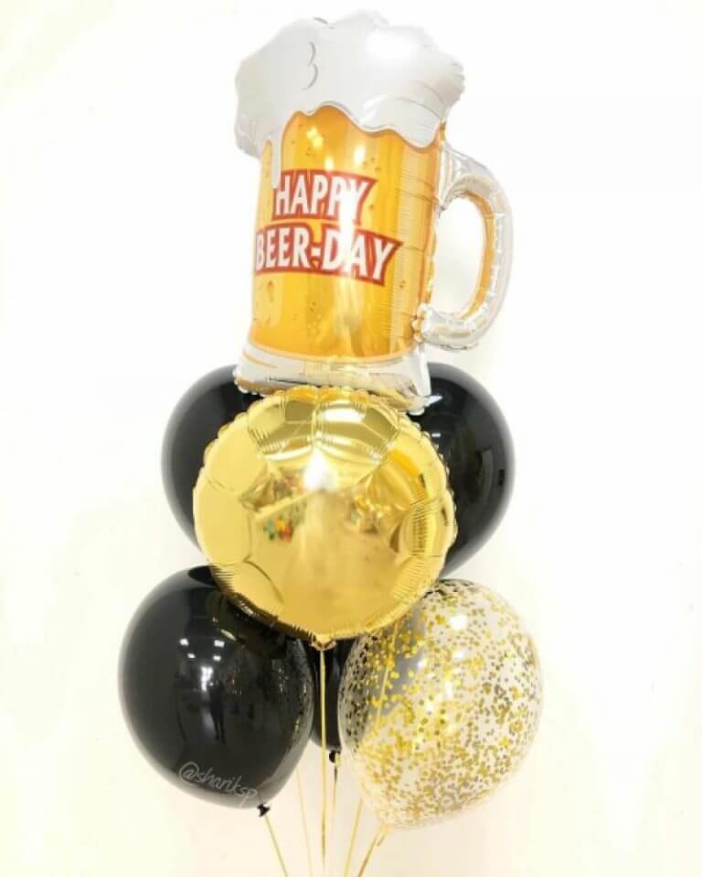 Фонтан шаров с кружкой пива
