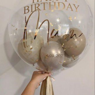 Шар с бежевыми шариками внутри